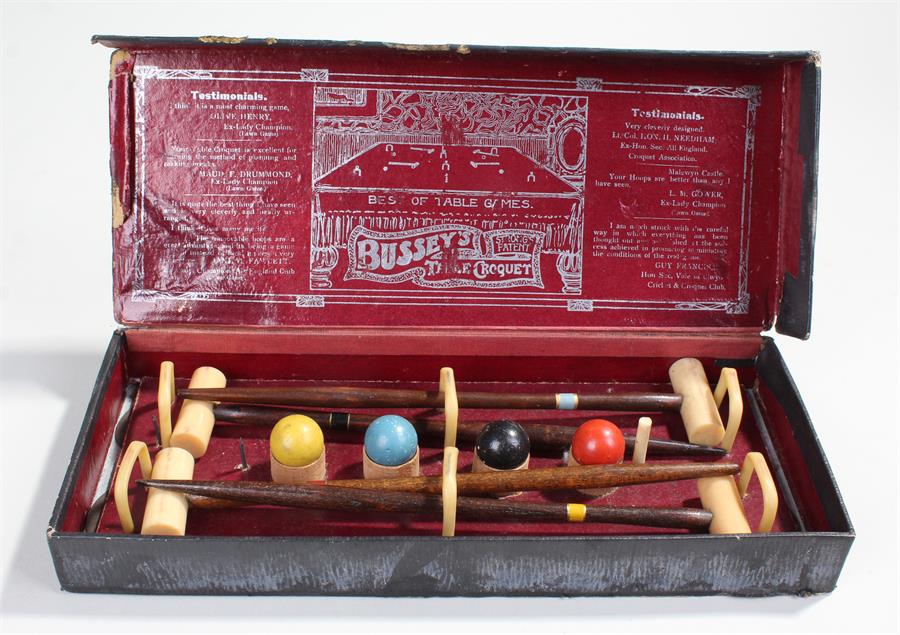 Boxed set of Bassey's table croquet, the miniature set with label to the interior lid, the box