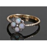 18 carat gold opal set ring, with four opals and five diamonds to the head, ring size M