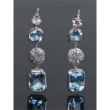 Pair of diamond and aquamarine earrings, with a row of diamonds and aquamarines to each drop, 32mm