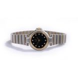 Dunhill stainless steel diamond dial ladies wristwatch, the signed black dial with diamond hours,