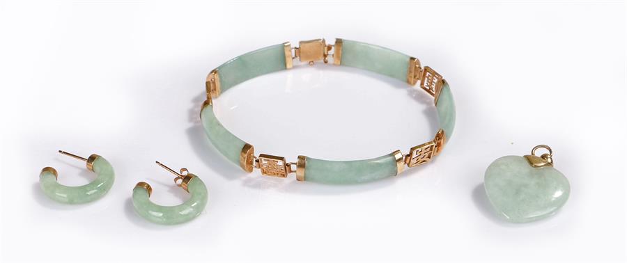 Jade jewellery set, the 9 carat bracelet with jade arches, a pair of jade earrings and a jade