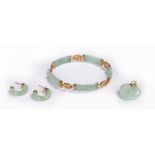 Jade jewellery set, the 9 carat bracelet with jade arches, a pair of jade earrings and a jade
