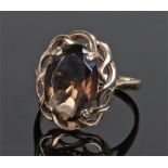 9 carat gold, smoky quartz ring, the oval smoky quartz stone with claw mount and fret head, ring