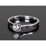 Diamond solitaire ring, the round brilliant cut stone set in an 18 carat white gold mount. the