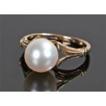 Mikimoto pearl ring, the pearl at 9mm diameter set to the gold shank, ring size M