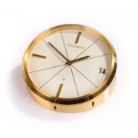 Jaeger Le Coultre desk timepiece, the signed white dial with date aperture, angled gilt case, 95mm