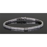 Diamond bracelet, the bracelet in 18 carat white gold set with round and baguette cut diamonds at an