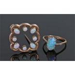 9 carat gold opal jewellery, to include an opal set brooch and an opal ring, (2)