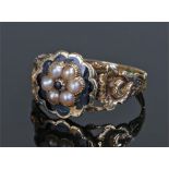 Victorian 18 carat gold pearl and enamel ring, the foliate head with leaf shoulders, ring size U