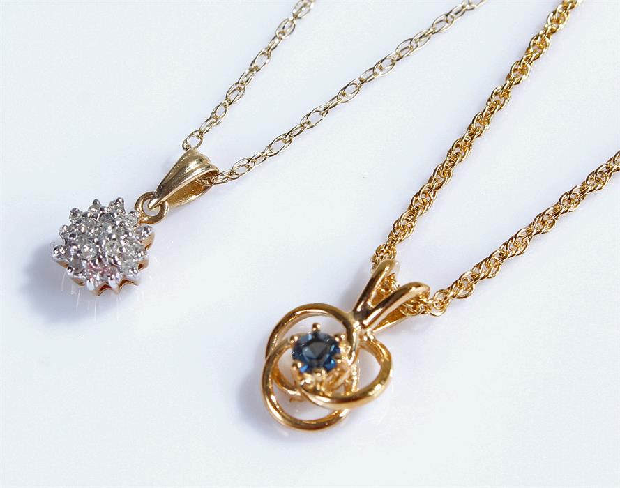 Two 9 carat gold pendant necklaces, the first with a sapphire and the second with a diamond, (2)