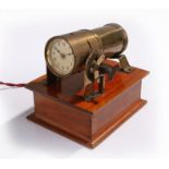 Rare circa 1930 night projector clock, the gilt projector, with a mahogany box case below