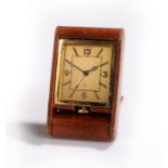 Jaeger Le Coultre desk time piece/ travelling clock, the leather case with gilt signed dial and