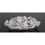 Early 20th Century diamond set brooch/buckle, the round and baguette cut diamonds to the white metal