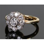 18 carat gold diamond set ring, the central diamond at 4.8mm in diameter approximately with a nine