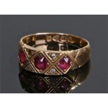 18 carat gold diamond and ruby ring, with three rubies and three diamonds (one missing) ring size N