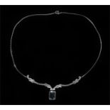 Aquamarine and diamond set necklace, the emerald cut aquamarine with diamonds set to the necklace