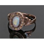 George III opal "poison" ring, the opal set hinged head with arched shoulders, ring size N