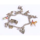 Silver charm bracelet, with various charms attached