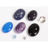 Unmounted stones, to include an amethyst, cubic zirconia, black onyx, sodalite, blue agate, blue