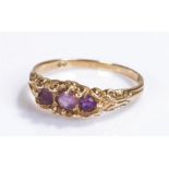 9 carat gold ring, set with amethysts, ring size P, 2.1 grams