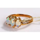 9 carat gold opal ring, with three opals, ring size O