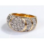 Yellow metal ring, set with white stones to the wide shank, ring size O