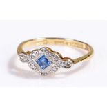 18 carat gold sapphire and diamond ring, the central sapphire with diamond surround, ring size J
