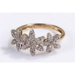 9 carat gold ring, with flower head design, ring size N