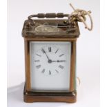 Carriage clock, the five glass case with a white enamel dial and Roman hours, lever platform