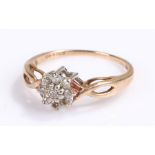 9 carat gold diamond set ring, with a diamond head flower design, ring size N