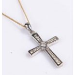 9 carat white gold cross, set with cubic zirconia, together with a 9 carat gold chain