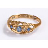 18 carat gold sapphire and diamond set ring, with a row of three sapphires and two diamonds, 3,8