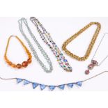 Necklaces, to include an amber effect necklace, blue stone necklace, yellow metal example, etc, (