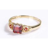 9 carat gold garnet ring, with three garnets, ring size N