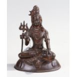 Deity statue, seated position with one hand raised. 19cm high