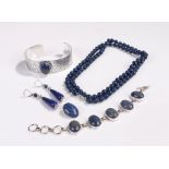 Lapis lazuli jewellery, to include a necklace, a bracelet, a pair of earrings, a brooch and