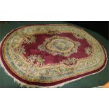 Tai Ping Chinese style red oval rug, 180 x 275cm