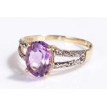 9 carat gold amethyst and diamond ring, set with a oval cut amethyst, ring size N