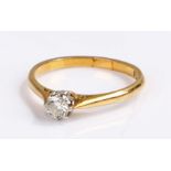 18 carat gold diamond set ring, wit a round cut diamond to the head with an eight claw mount