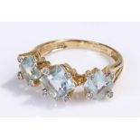 9 carat gold ring, set with blue topaz and diamonds to the corners, ring size N