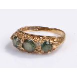 9 carat gold stone set ring, with three green stones and four diamonds