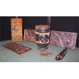 Tribal art, to include a carved plaque, stamped metal plaques, carved rhino, drum, mask, etc, (Qty)