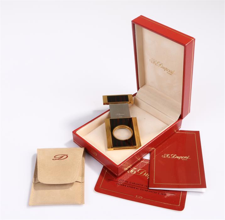 Dupont cigar cutter, in a marble bark effect and gold plated surround, together with the case and