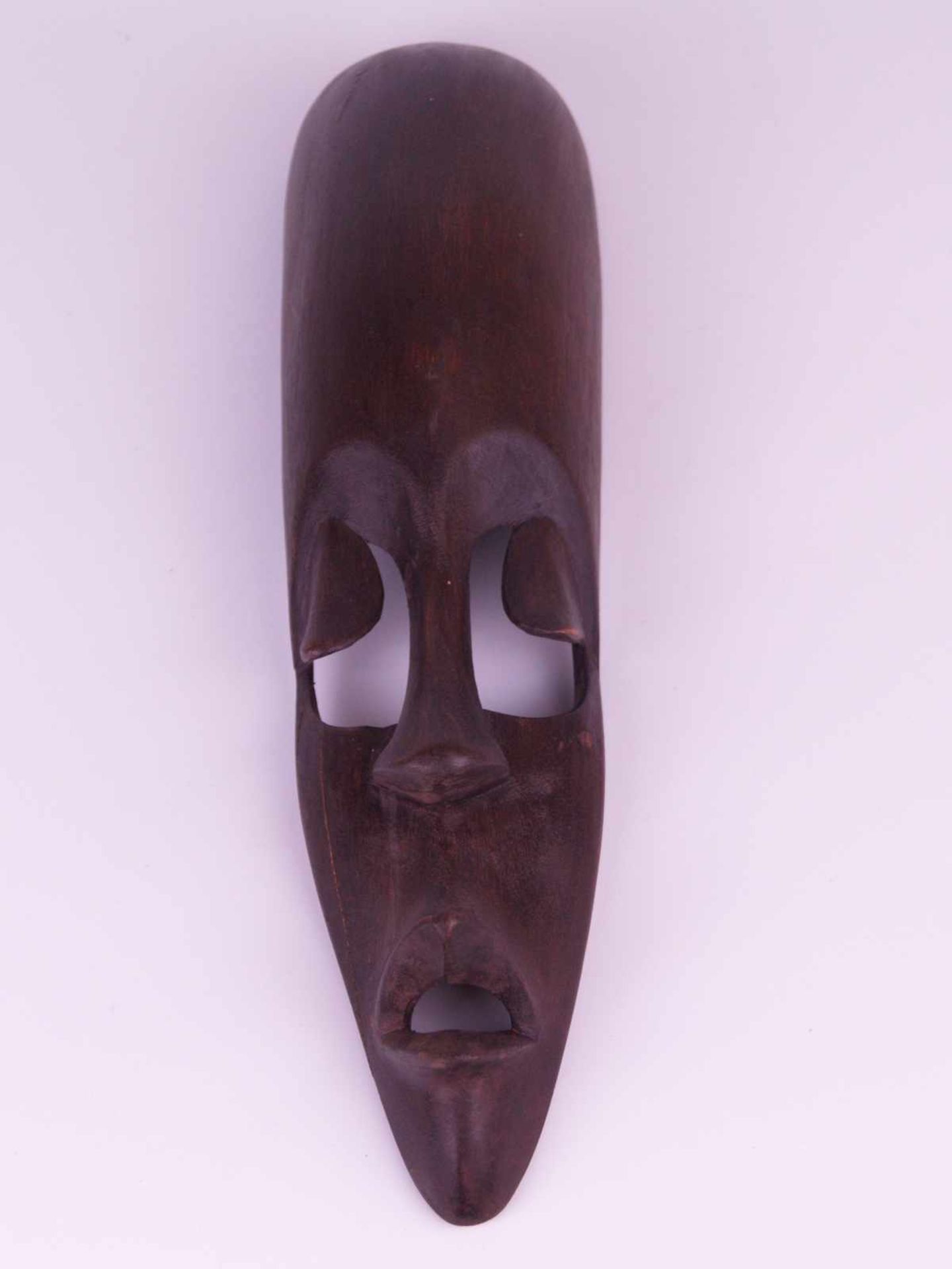 Gesichtsmaske - Kongo, braunes Holz geschnitzt, schmale längliche Form, L.ca.32cm, 2 Haarrisse ca.
