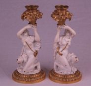 Paar figürliche Kerzenleuchter - Bronzelegierung,vergoldet,einflammig,ges ockelte kniende