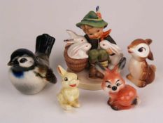 Konvolut Hummel-Figuren - Goebel, 5-tlg.: 1x Hummelfigur Junge mit Hasen, 1x Hummelfigur Hase, 2x