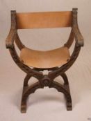 Scherenstuhl - Holz beschnitzt, Sitzfläche und Rückenlehne Leder; Höhe ca.85cm, Breite ca.61 cm,