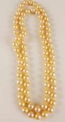 Perlenkette - einreihige Endloskette, gleichmäßige cremefarbene Zuchtperlen (D.ca.8 mm) in