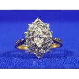 18CT GOLD & DIAMOND RING WITH 1 CARAT OF DIAMONDS IN A MARQUISE CLUSTER