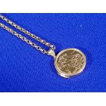 22CT GOLD SOVEREIGN 1979 MOUNTED IN 9CT GOLD MOUNT & ON A 9CT GOLD CHAIN